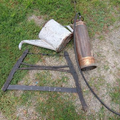 Brass fire ext. Galvanized water can, bow saw