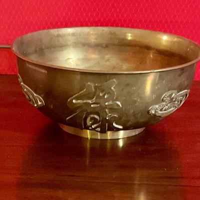 Brass bowl with Chinese letters in good used condition