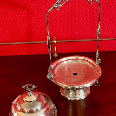 Silver plated butter server with ice well. In good used condition