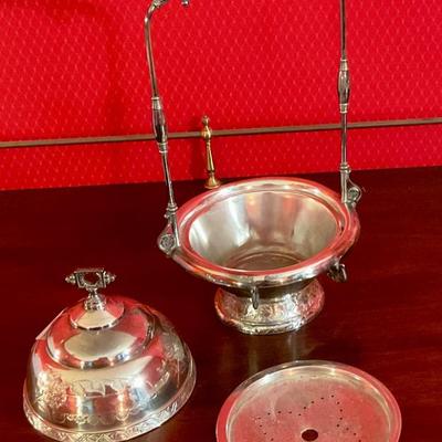 Silver plated butter server with ice well. In good used condition