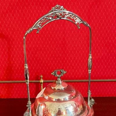Silver plated butter server with ice well. In good used condition