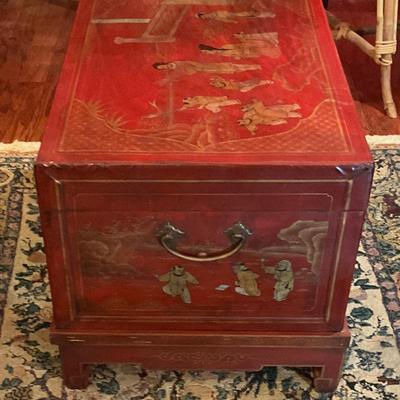 Chinese red lacquer chest on stand, used a coffee table, great storage