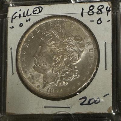 1884 O MORGAN XVF FILLED O U S. COIN SILVER