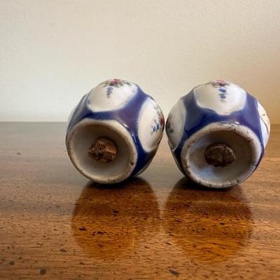 A Collection of Salt & Pepper Shakers with Sugar Trinket
