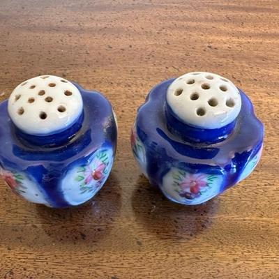 A Collection of Salt & Pepper Shakers with Sugar Trinket