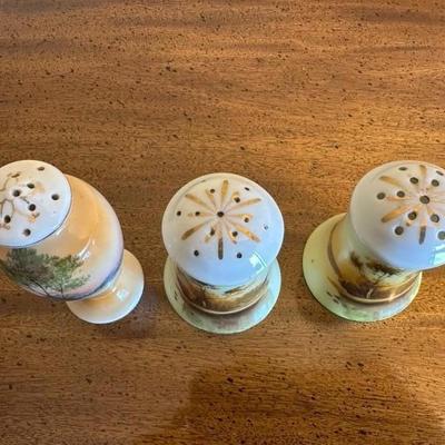A Collection of Salt & Pepper Shakers with Sugar Trinket