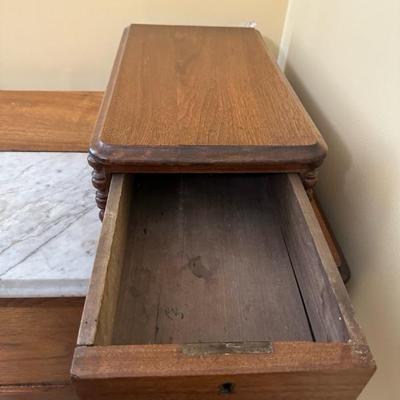 Antique Wooden Dresser with Unique Features