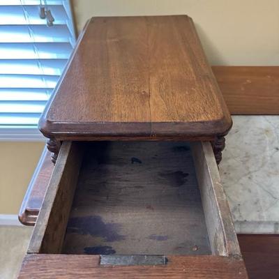 Antique Wooden Dresser with Unique Features