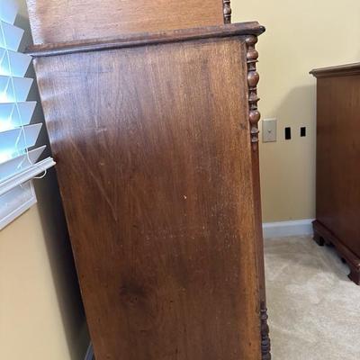 Antique Wooden Dresser with Unique Features