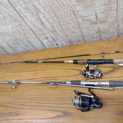 Pair of Fishing Rods and Reels Open Face