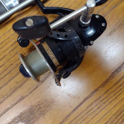 Pair of Fishing Rods and Reels Open Face