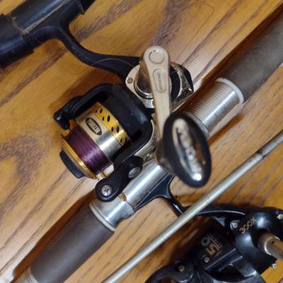 Pair of Fishing Rods and Reels Open Face