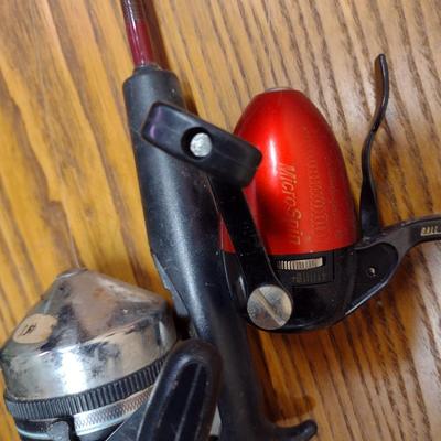 Pair of Fishing Rods and Reels Closed Face