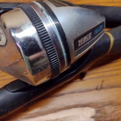 Pair of Fishing Rods and Reels Closed Face