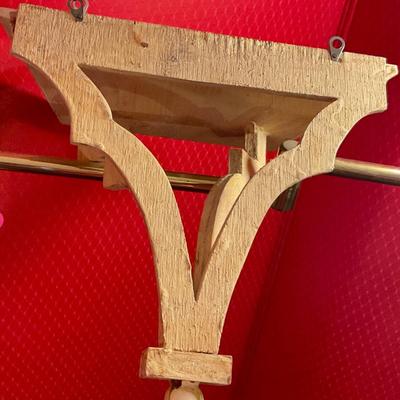 Two wooden wall sconces