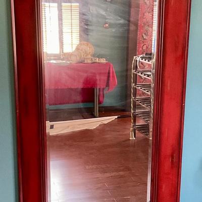 Long red framed mirror, wired to hang long side up