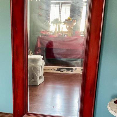 Long red framed mirror, wired to hang long side up