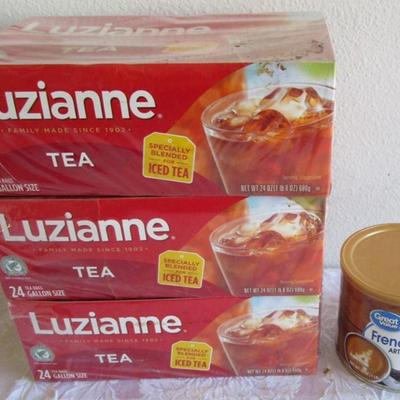 3 boxes of Luzianne ice tea bags and 1 can of Cappuccino
