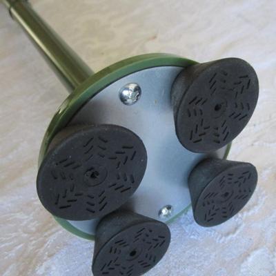 Green walking cane free standing