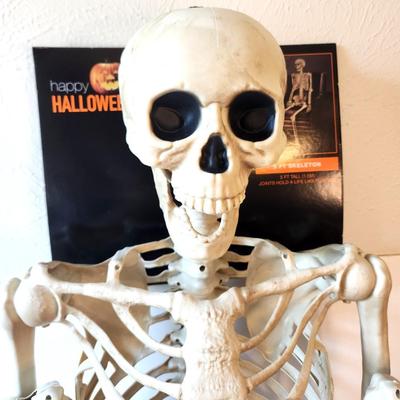 Lot #21 Halloween Jointed Skeleton Decoration - new on card