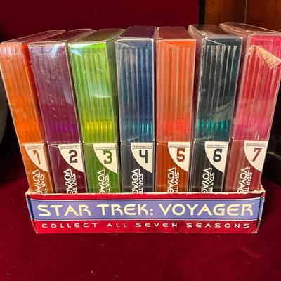 Lot# 186. Star Trek Lot ( DVD’s & Clock )