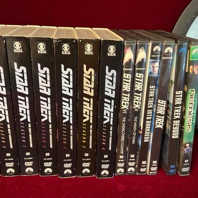 Lot# 186. Star Trek Lot ( DVD’s & Clock )