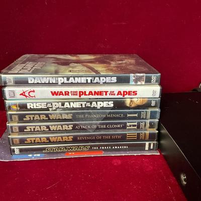 Lot# 187 FC DVD Player & DVD’s ( 16)