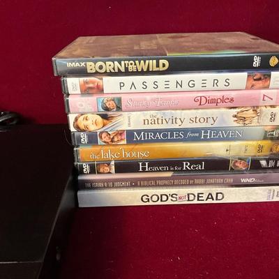 Lot# 187 FC DVD Player & DVD’s ( 16)