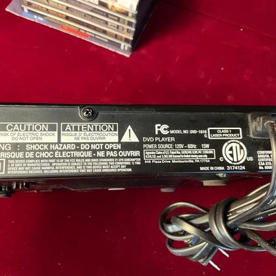 Lot# 187 FC DVD Player & DVD’s ( 16)