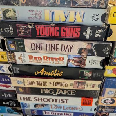 Assortment Of VHS Tapes Choice B