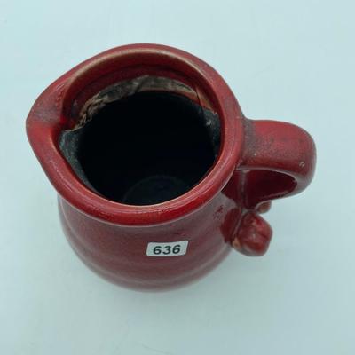 Red pitcher