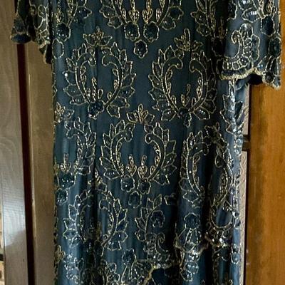 Black and gold sequined dress by Ste’na