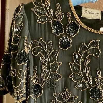 Black and gold sequined dress by Ste’na