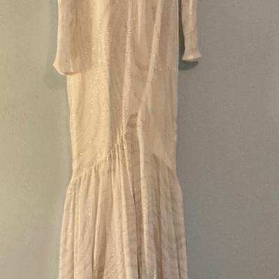 Elegant sparkly white dress with ruffles