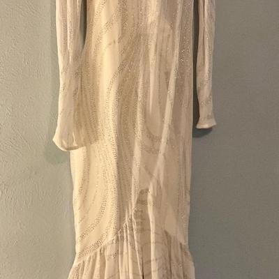 Elegant sparkly white dress with ruffles