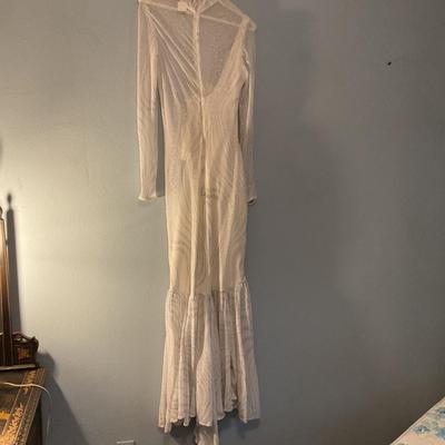 Elegant sparkly white dress with ruffles