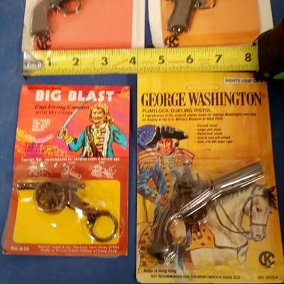 LOT 10 FOUR VINTAGE CAP GUNS