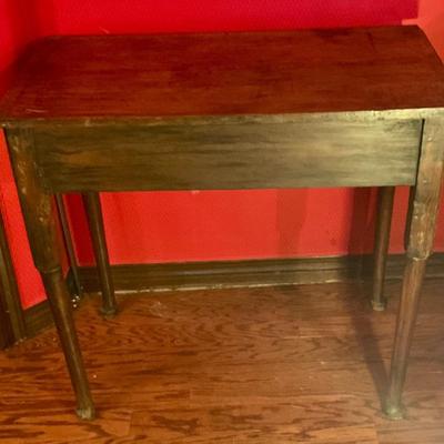 2 drawer antiqued pegged table with carved front and shell drawer pulls