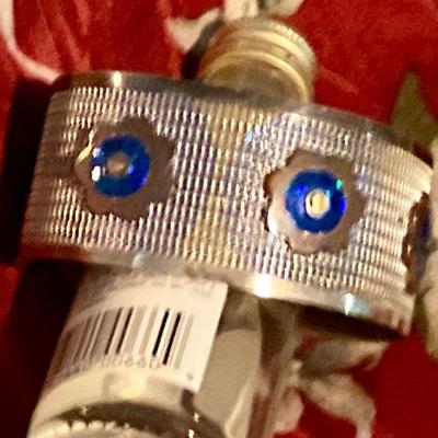 Cute costume bracelet studded with blue and copper flowers