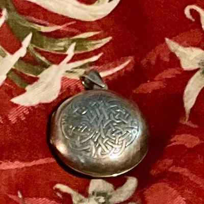 Sterling silver locket with poem on back, Celtic symbol on front