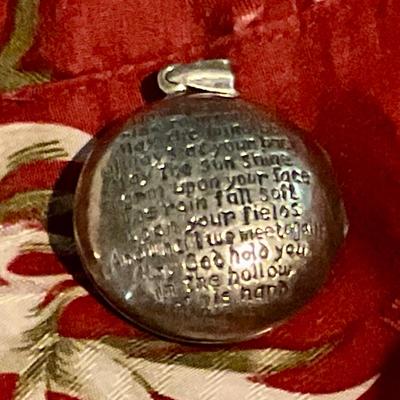 Sterling silver locket with poem on back, Celtic symbol on front