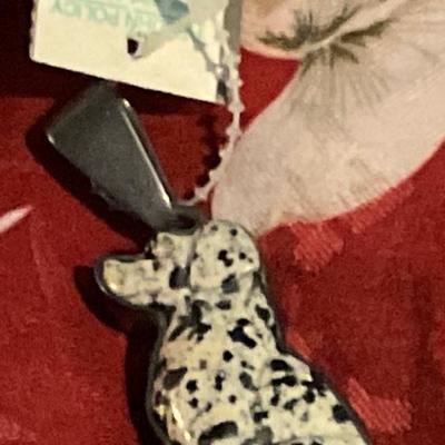 Porcelain dog figure in sterling silver bezel