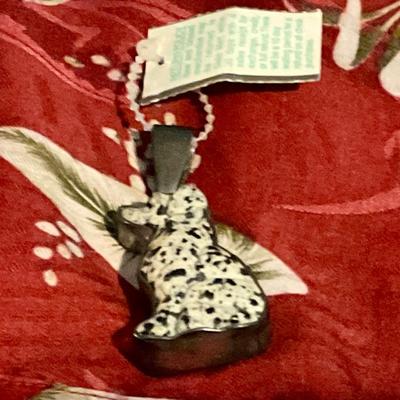 Porcelain dog figure in sterling silver bezel