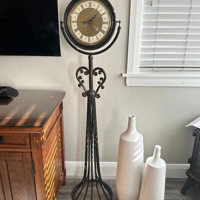 Metal pedestal clock. 54"