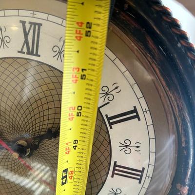 Metal pedestal clock. 54"