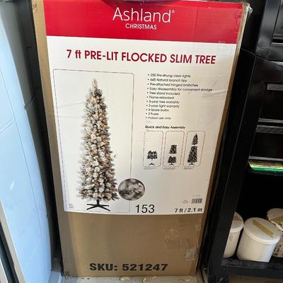 7ft. Pre-lit Flocked Slim Tree