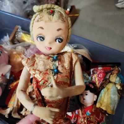 Container full of Vintage Dolls