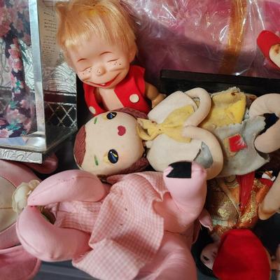 Container full of Vintage Dolls