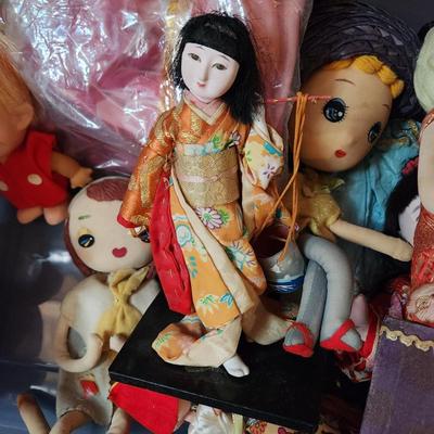Container full of Vintage Dolls