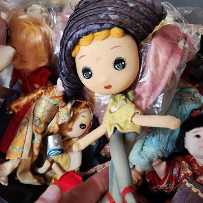 Container full of Vintage Dolls
